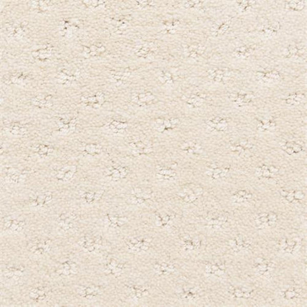 Close-up of Dreamer On Trend Carpet in Pastel: a light beige, textured surface with small, evenly spaced raised dots for a subtle pattern—perfect for luxury flooring with elegant, plush fibers.