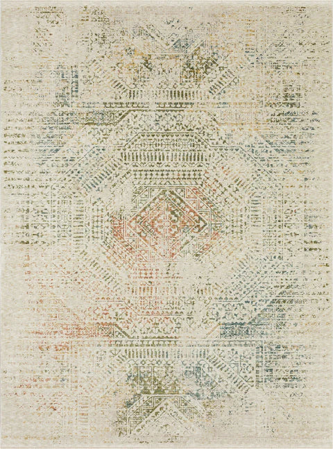 The Momento Pathways Area Rug by Karastan Rugs features a beige base with a faded geometric and tribal pattern in muted green, blue, and orange tones, creating a vintage, distressed look.
