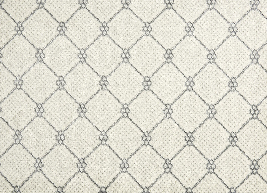 Lake Boden Berber Carpet in Pearl features a repeating diamond pattern outlined in gray, with small decorative knots at each intersection, offering a geometric, textured look that's perfect for modern home flooring.