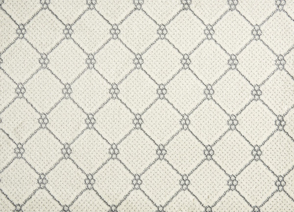 Lake Boden Berber Carpet in Pearl features a repeating diamond pattern outlined in gray, with small decorative knots at each intersection, offering a geometric, textured look that's perfect for modern home flooring.