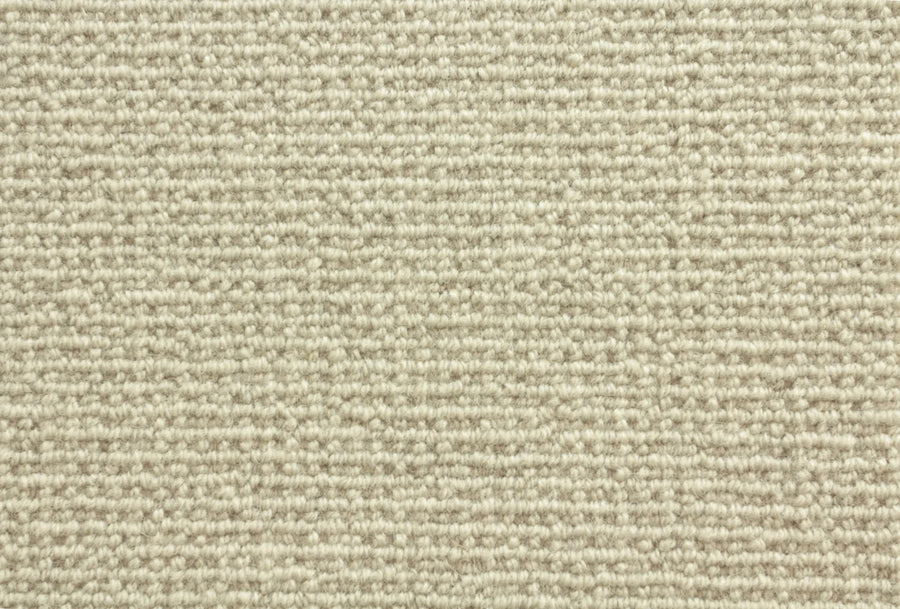 Close-up view of Sequoia Berber Carpet in Pebble color, featuring a looped texture with evenly spaced rows, made from premium materials for durable, soft, and uniform flooring ideal for high-traffic areas.