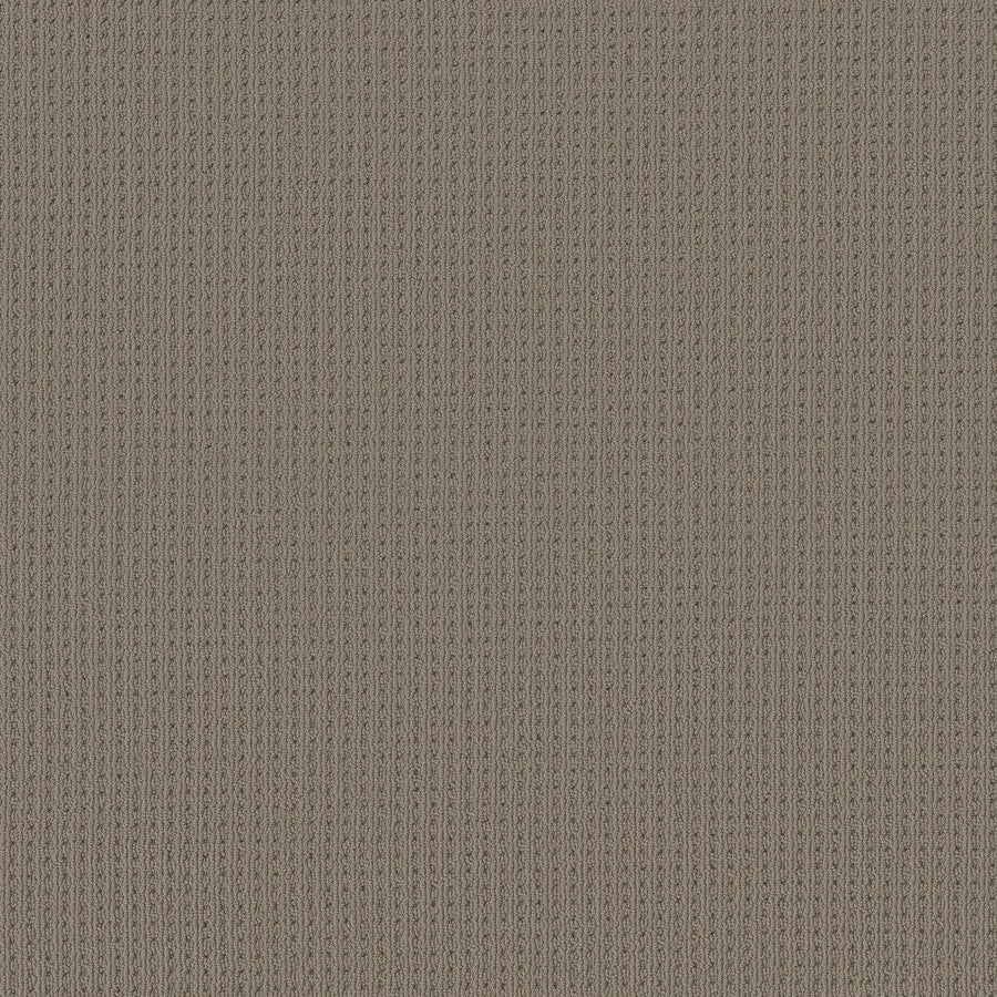 Close-up of San Lucas Family Friendly Carpet in Pewter, featuring textured vertical ribbed patterns and detailed stitching—offering a soft, cozy look as an ideal family-friendly alternative for high-traffic homes.
