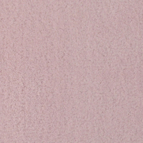 Close-up of Seduction On Trend Carpet in Pink Nectar, featuring a soft, plush surface with densely packed fibers for a cozy, elegant look. The light pink shade and subtle texture highlight its durability and luxury. No objects or patterns are visible.