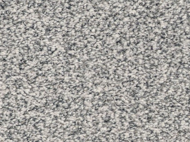 Close-up of Innovative Comfort III Pet Friendly Carpet in Pinwheel, featuring a textured loop-pile design with light gray and white fibers for a soft, neutral patterned look.