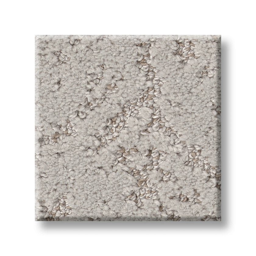 Sincere Focus On Trend Carpet is a square sample of textured light gray carpet with a subtle print, short looped fibers for softness, and beige accents for a modern, contemporary look.