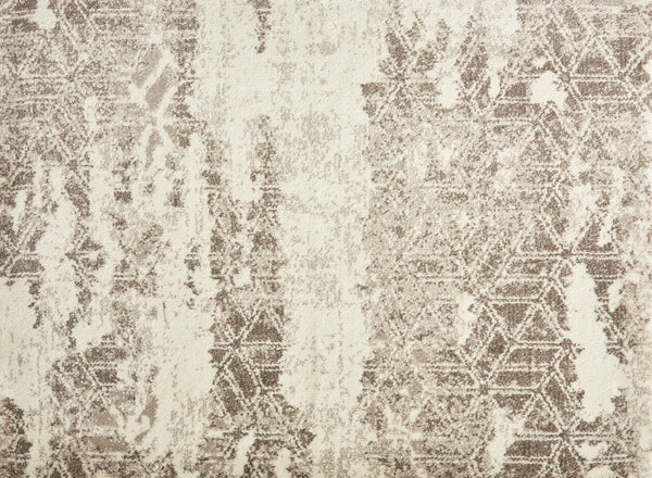 The Delphi On Trend Carpet in Platinum features a faded abstract geometric pattern with interlocking hexagons and a distressed texture—an elegant, modern flooring choice for any space.