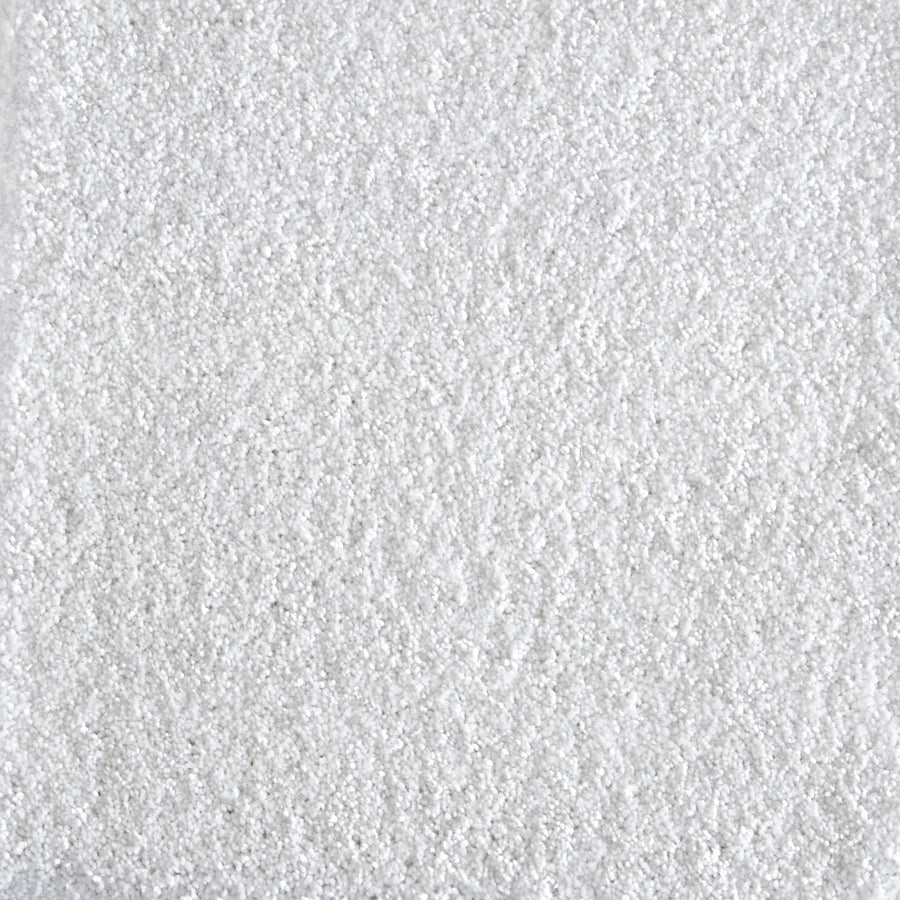 Close-up view of Jazzy Family Friendly Carpet in Platinum, featuring a textured white surface with a fine, crystalline look—perfect for elegant, durable flooring in high-traffic areas.