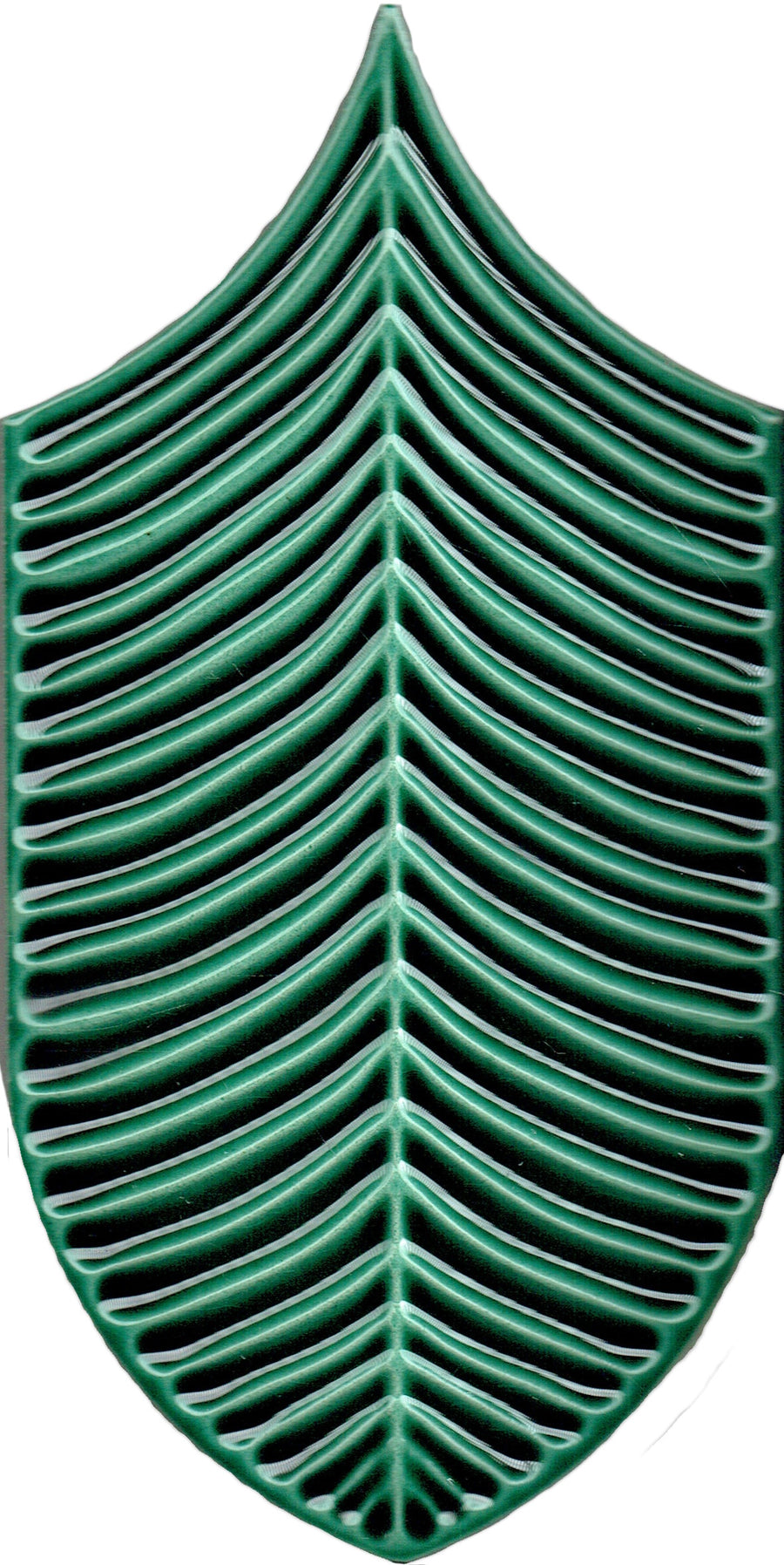 The Plume 4x8 Ceramic Tile features a green, stylized symmetrical leaf with raised rib-like geometric veins, inspired by tropical tile design on a white background.