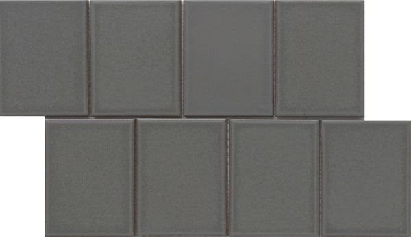 Eight glossy Marco and Polo 4x5 Porcelain Tiles in Polo Coal are arranged in two staggered rows on a white background. Each frameless tile shows subtle borders and varied shading, giving a textured, modern designer look.