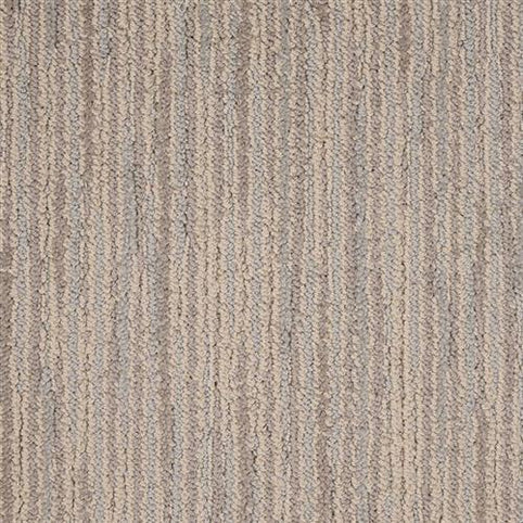 Close-up of the Artist View On Trend Carpet in Portrait color, featuring soft, woven texture and vertical, slightly wavy stripes in beige and light brown for a stylish, subtle look.