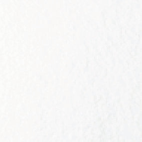 A close-up of the NEOStone Linear End Drain Shower Base shows its white, textured surface with subtle shading and texture variations, indicating slip resistance and a sleek, low-profile design.