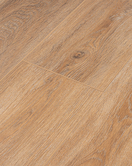 Close-up of Moda Living II 7.15" Luxury Vinyl Plank flooring in light brown, highlighting visible grain patterns, knots, texture, and seams between these durable vinyl planks.