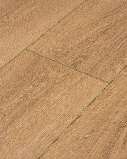 Close-up of Moda Living II 7.15" Luxury Vinyl Plank flooring, featuring light brown tones and a natural wood grain pattern in a staggered layout.