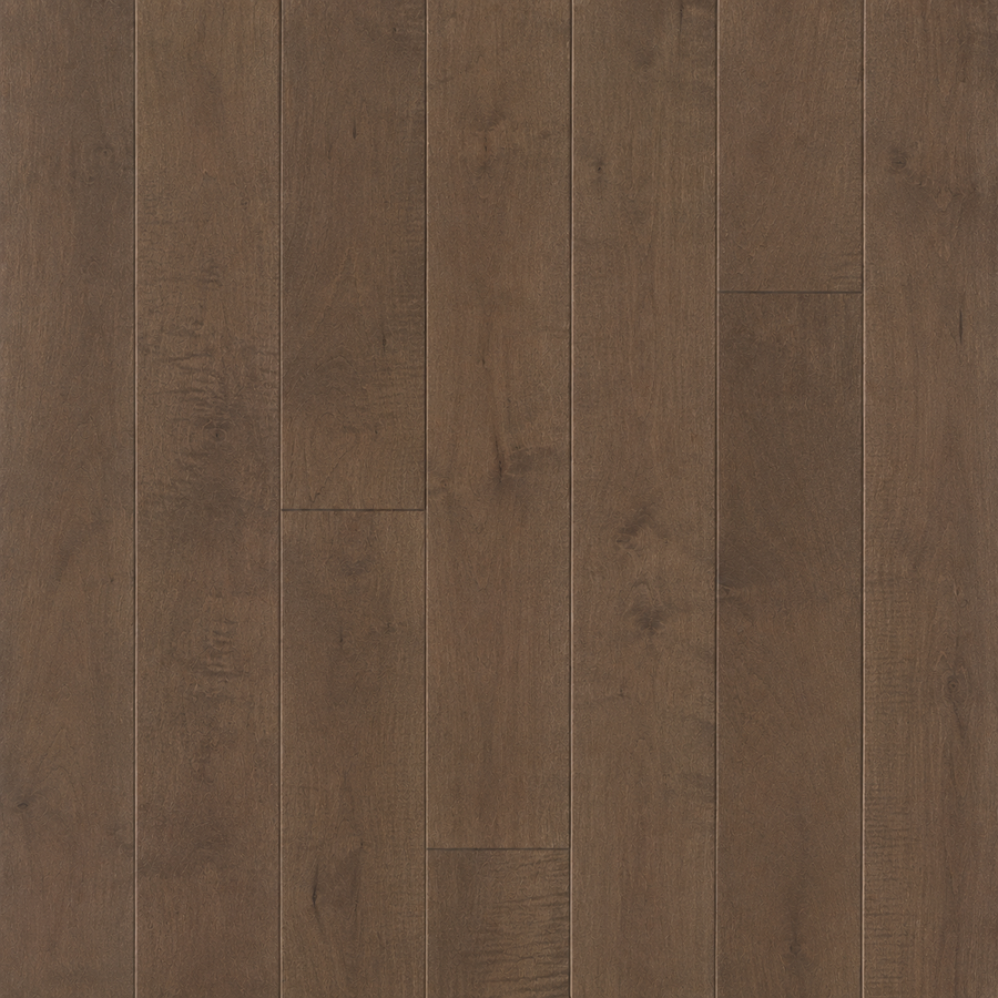 A close-up view of Pure Maple 4 1/4" Hardwood in Toasted Shortbread color, featuring visible wood grain and varying plank widths, arranged vertically in a straight pattern.