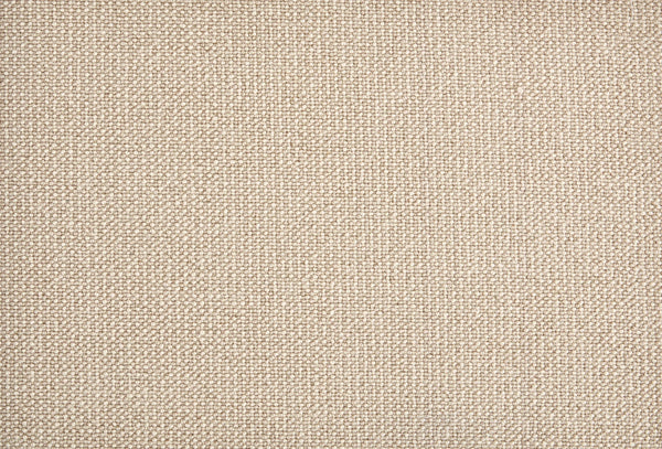Close-up of Harper Berber Carpet in Putty, featuring a beige woven texture with small, tightly interlaced threads for everyday durability and a consistent, natural look.