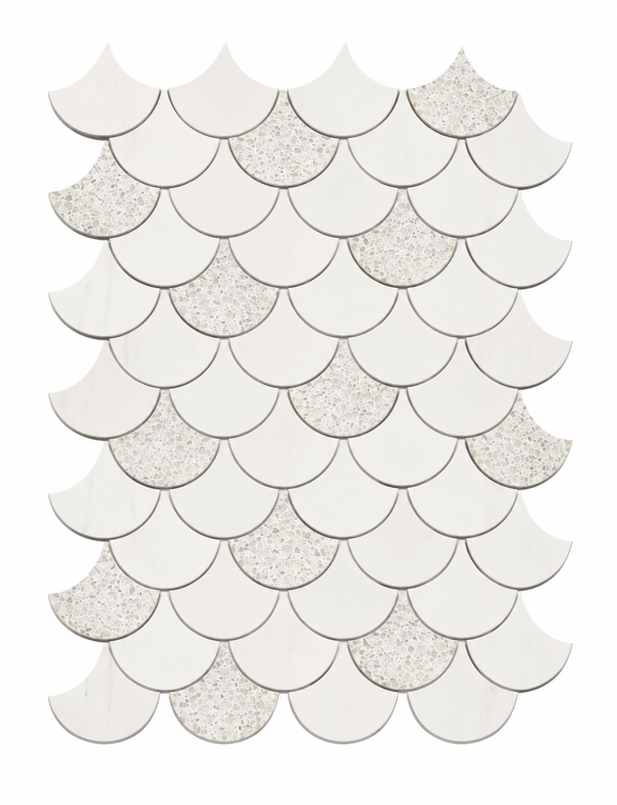 Amplify from the Revive Terrazzo & Dolomite 2″ Fish Scale Mosaic collection features fish-scale-shaped tiles arranged in overlapping rows to create an elegant mosaic effect, blending smooth, solid white pieces with speckled tiles that evoke the look of terrazzo among the pristine surfaces.