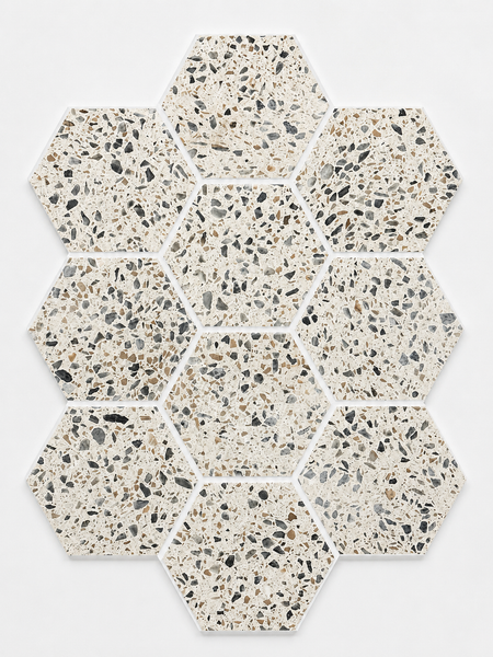Twelve Revive Korbell & Dolomite 5″ Hex Mosaic tiles in the color Pave are arranged in a honeycomb pattern on a white background. These premium bathroom tiles showcase a blend of beige, brown, and gray stone accents set in light cement.