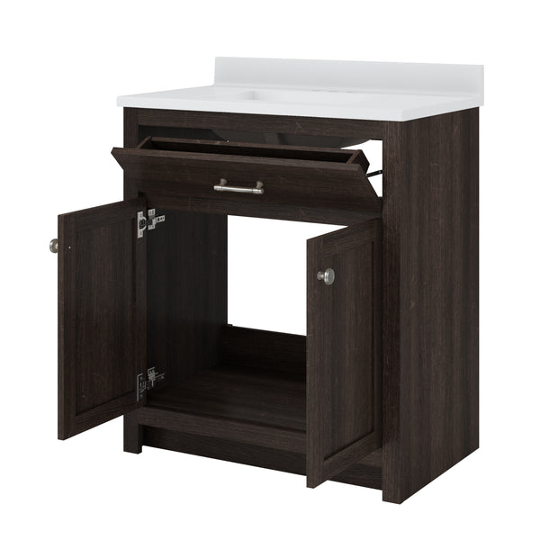 A dark wood bathroom vanity with a white countertop. The vanity has two open lower doors and a tilted open upper drawer, revealing empty storage space inside.