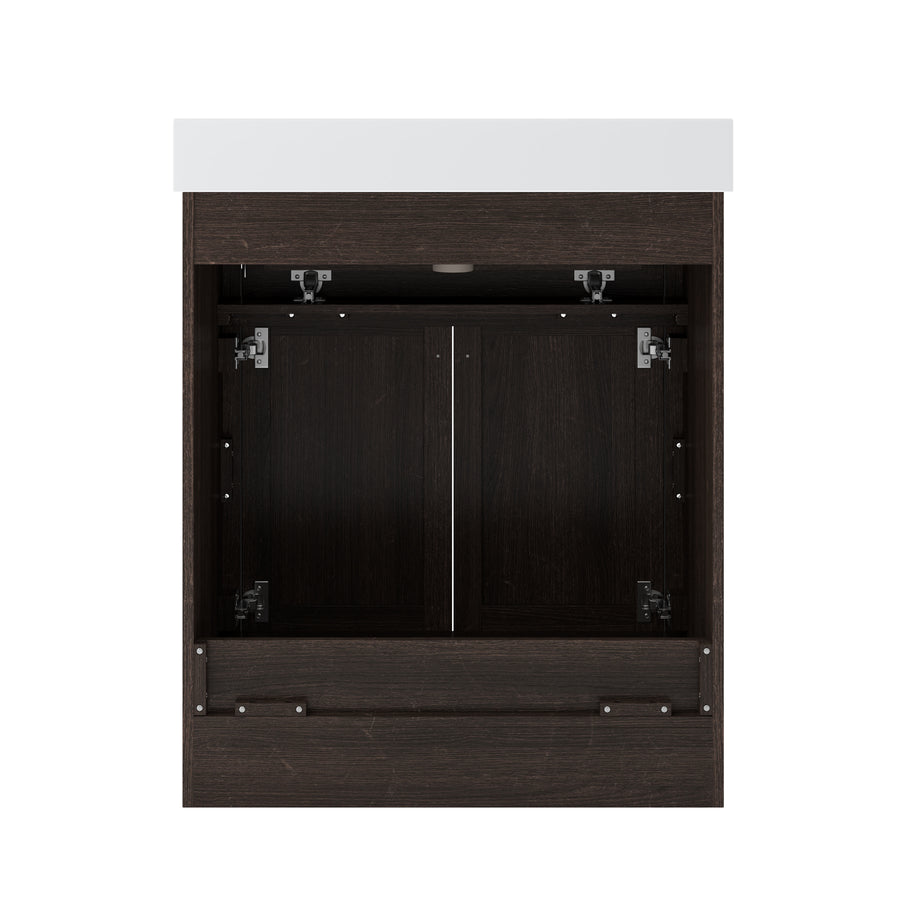 Dark wood bathroom vanity cabinet with two doors open, revealing an empty interior and plumbing cutout, topped with a white countertop, shown against a white background.