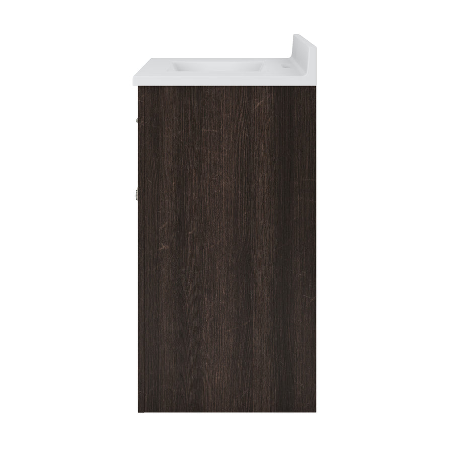 Side view of a bathroom vanity with a white sink and a dark wood cabinet, isolated on a white background.
