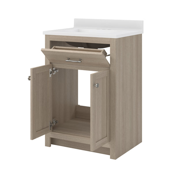 A light wood bathroom vanity with a white sink on top, featuring an open tilt-out drawer and two open cabinet doors below, revealing empty storage space inside.