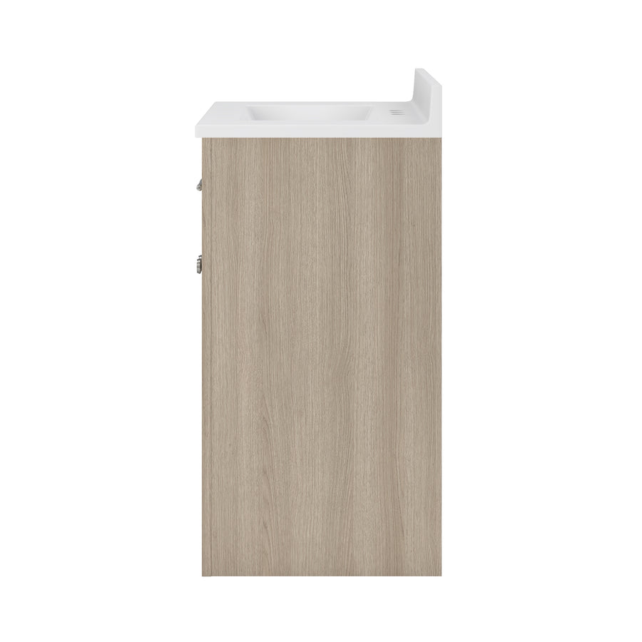 Side view of a modern bathroom vanity cabinet with a light wood finish and a white sink countertop. The cabinet doors and hardware are not visible in this perspective.