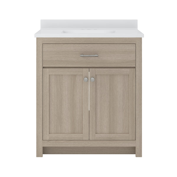 A light wood bathroom vanity with a white countertop, a single drawer with a horizontal metal handle, and two cabinet doors with round metal knobs. The design is simple and modern.