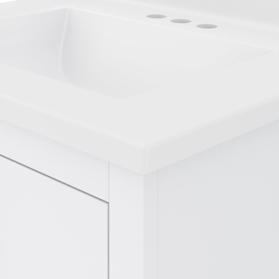 Close-up view of a modern, white bathroom vanity with a built-in rectangular sink and three faucet holes on the countertop. The design is minimalistic and sleek.