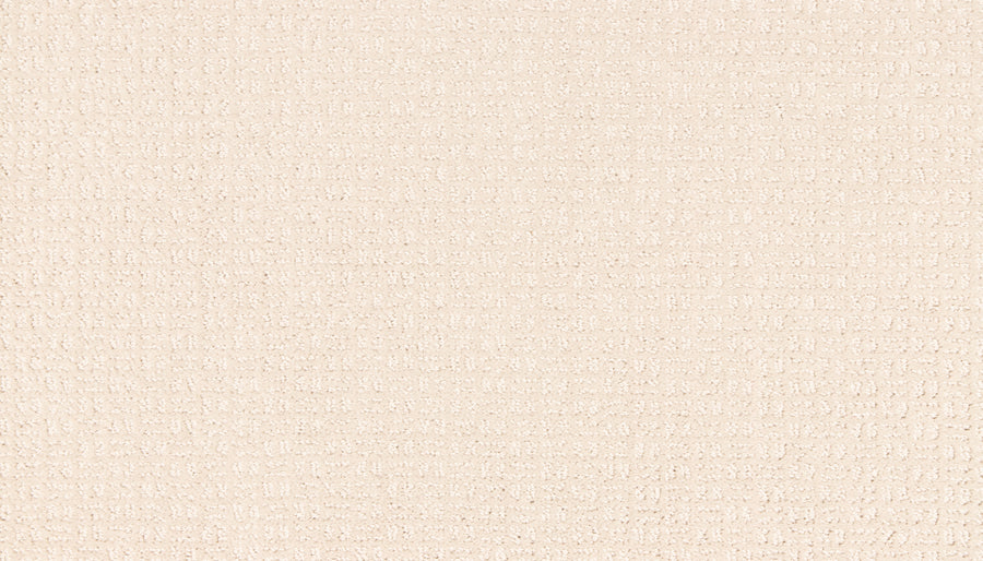 A close-up of the Radiant Space On Trend Carpet in Buffed shows its light beige hue and subtle woven texture, reflecting the cushioned surface typical of modern contemporary carpets.