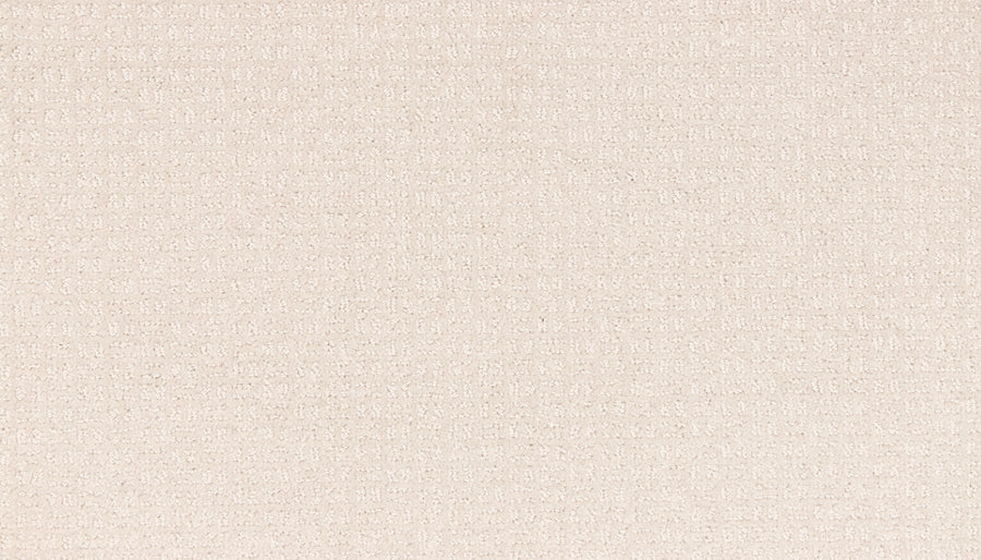 A close-up of the Radiant Space On Trend Carpet in Haze, showcasing its beige, textured fabric with a subtle woven pattern and soft, matte finish for a contemporary look.