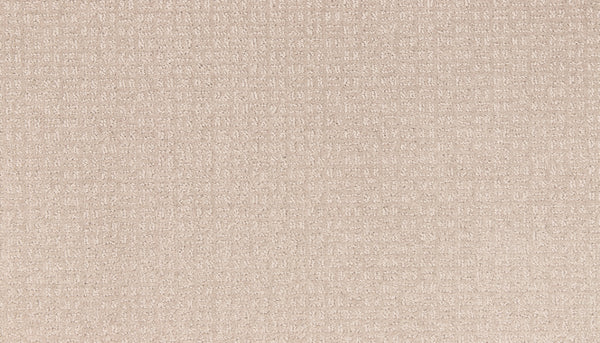 Close-up of Radiant Space On Trend Carpet in Clam Island color, showing a cushioned beige surface with a soft feel and subtle, evenly spaced grid pattern for a modern, contemporary look.