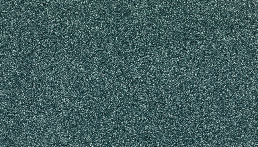 Close-up of Radiant Surface Pet Friendly Carpet in Mermaid color, showing its textured, gritty gray-green surface and uniform look, highlighting its stain-resistant durability.
