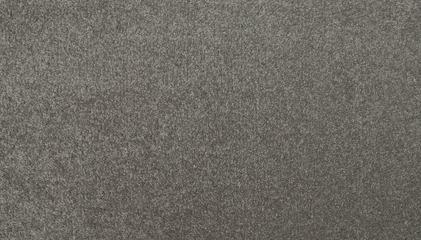 Close-up of the Radiant Surface Pet Friendly Carpet in Rough Stone—a grey, textured luxury carpet with a soft, dense surface and subtle shine. Uniform fiber distribution offers stylish comfort, ideal for homes with pets.