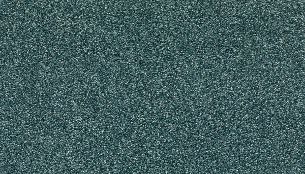 Close-up of Radiant Tone Pet Friendly Carpet in Mermaid color, showcasing its textured, grainy surface in grey and blue-green hues—luxury carpet known for excellent stain resistance.