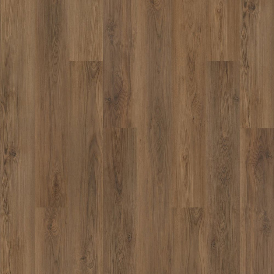 Barker Hollow 7.5" Vinyl flooring features a medium brown wood-look with natural grain and subtle knots, arranged in a staggered plank layout for a warm, rustic feel.