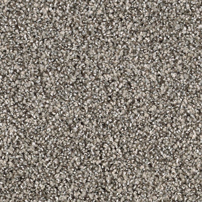 Close-up of Shaded Escape Family Friendly Carpet in Rapids, featuring tightly looped fibers in light and medium gray for a soft, durable, and uniform surface ideal for families.
