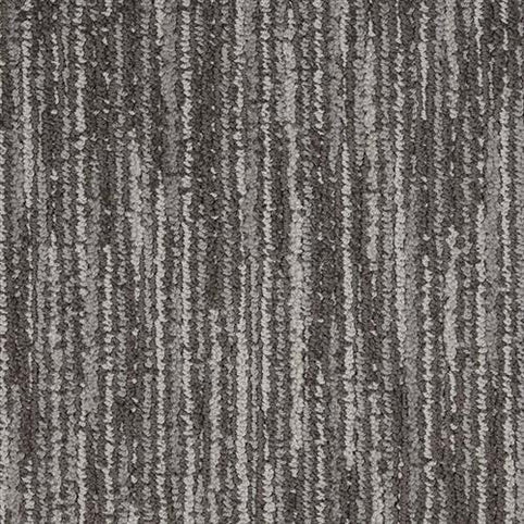 Close-up of Artist View On Trend Carpet in Raw Umber, featuring vertical stripes in modern light and dark tones. This durable carpet offers a soft surface with a subtle, sophisticated pattern.