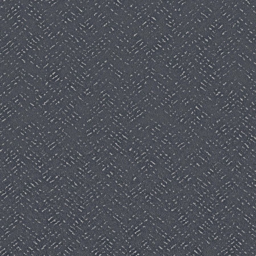 Favoured Path Pet Friendly in Refined features a dark grey herringbone pattern with light grey dashes for a subtle, modern look. Durable and ideal for commercial flooring in contemporary spaces, it’s also pet friendly.