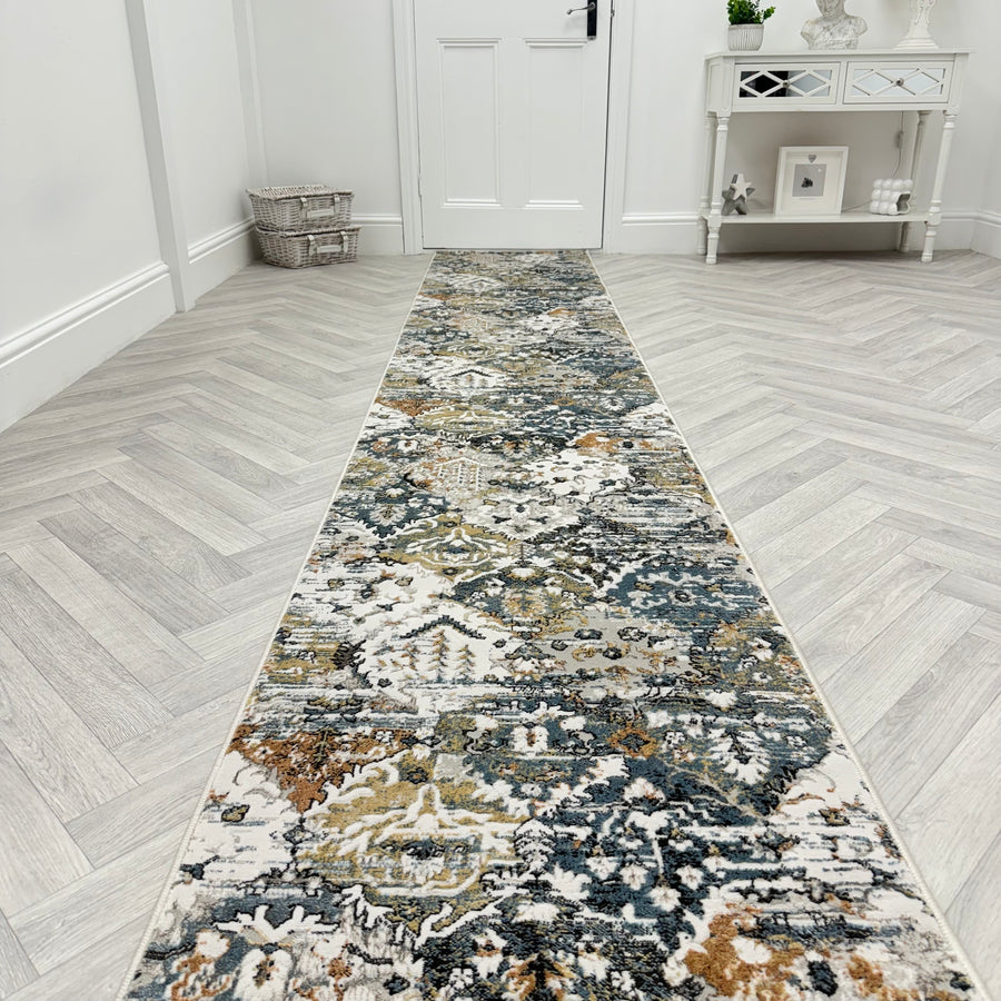 The Reha 1063-185 Runner Rug brings style and warmth to your hallway, effortlessly complementing durable flooring.