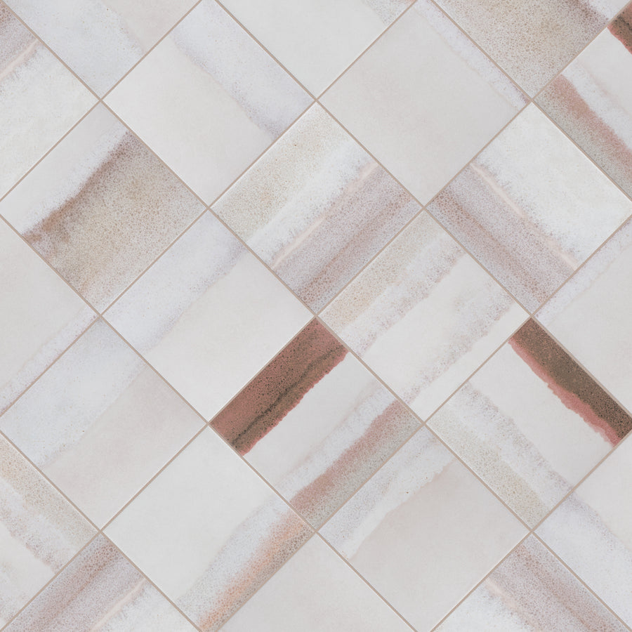 Beige and light brown ceramic tiles arranged diagonally, featuring subtle horizontal stripes and gradients with a slightly textured appearance. The overall pattern creates a modern, geometric look.