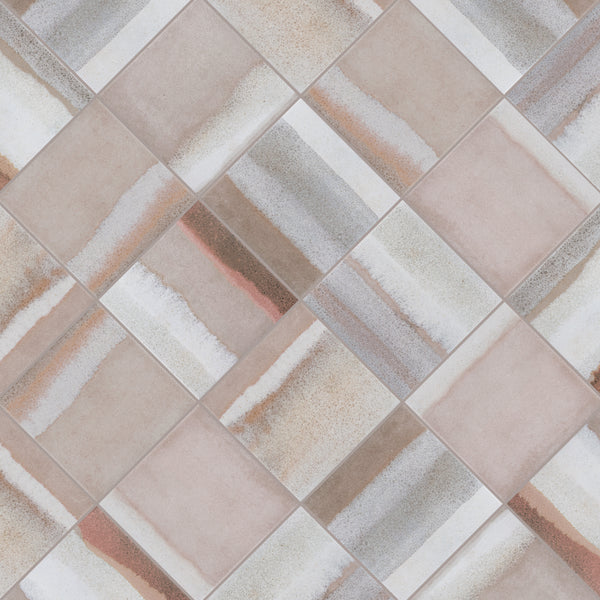 A close-up of ceramic tiles arranged in a diagonal checkerboard pattern, featuring beige, brown, and gray tones with varied, streaky textures on each tile.