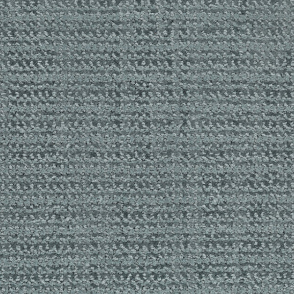 Close-up of Beguiling Berber Carpet in Retro color, showcasing a looped pile surface with a textured horizontal and vertical repeating pattern in muted blue-gray tones.