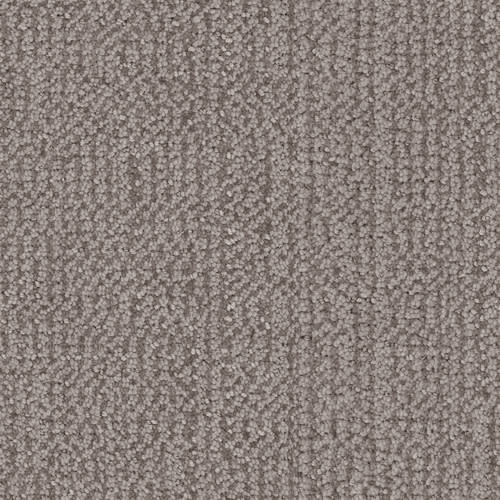 Close-up view of Occasion On Trend Carpet in Reverence, a loop-pile tile with soft, dense texture and a subtle linear pattern in neutral gray.