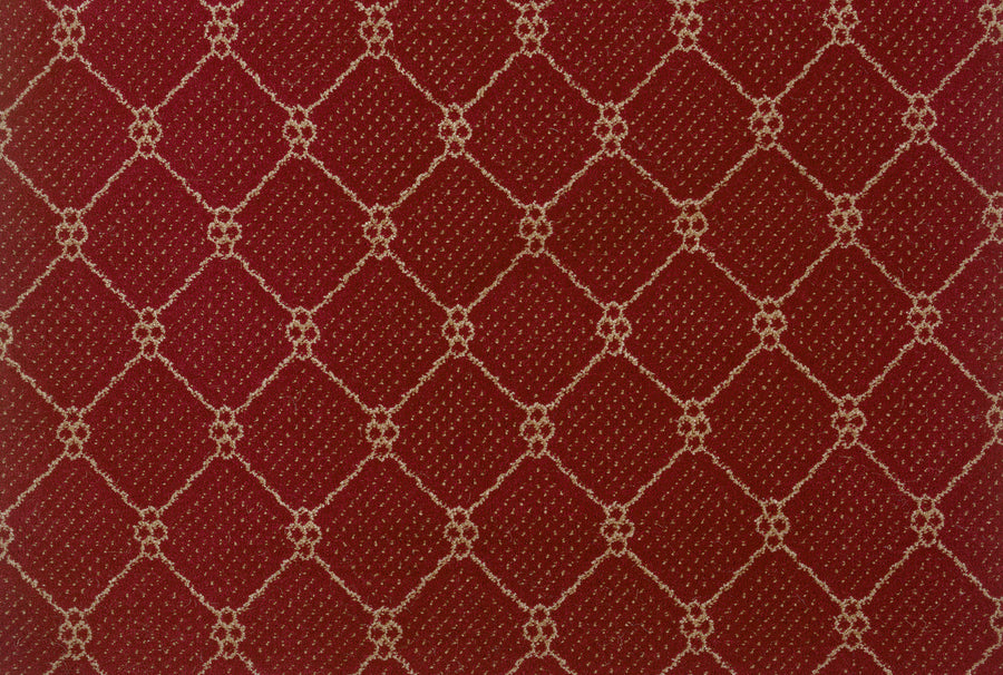 The Lake Boden Berber Carpet in Robin Red features a repeating diamond pattern outlined in beige, with dotted centers and circular motifs at intersections—ideal for adding modern elegance and durability to your flooring.