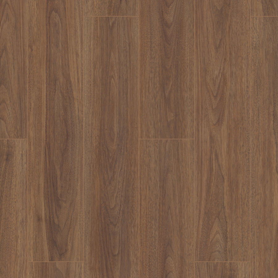 Close-up view of Coretec Pro Plus Enhanced Vinyl flooring with a rich brown finish, highlighting natural wood grain patterns and visible seams—showcasing the elegance and durability of this rigid core luxury option.