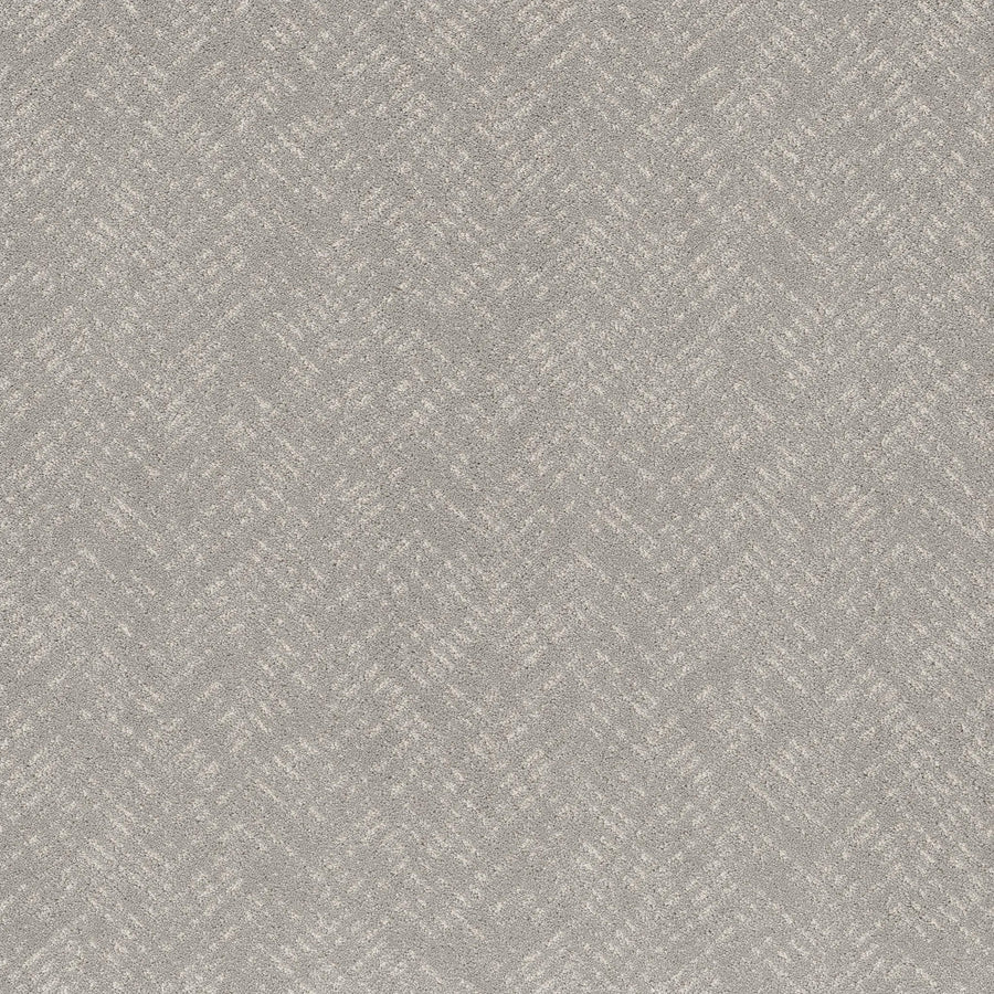 Favoured Path Pet Friendly in Rock Crystal features a light grey textured surface with a subtle diagonal herringbone pattern, creating a soft, woven look. This contemporary flooring is ideal for commercial spaces, offering consistent and sophisticated style.