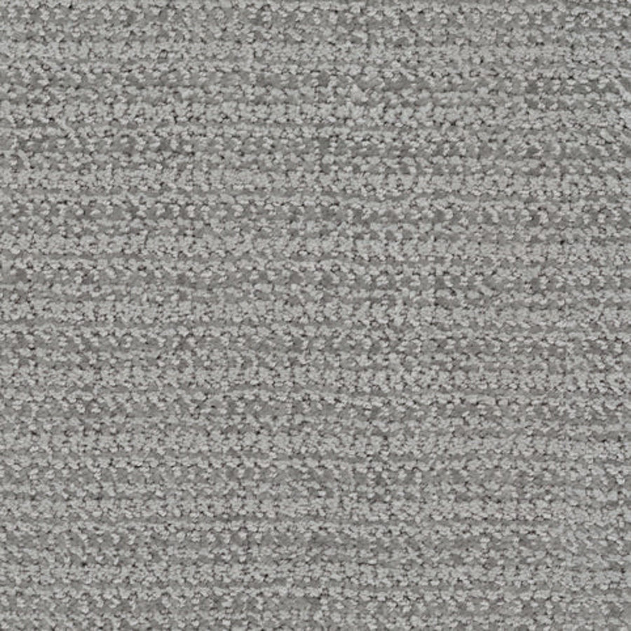 Close-up of Beguiling Berber Carpet in Rock On color, featuring a textured gray surface with subtle horizontal stripes. The soft, slightly shiny weave reflects light for a luxurious flooring effect.