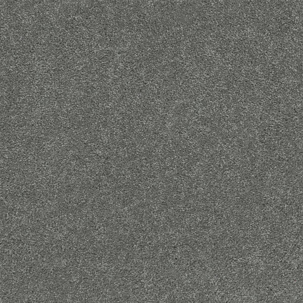 Close-up of Rock Solid III Family Friendly Carpet in Armor—gray, textured surface with dense, soft feel and subtle mottling, perfect for creating a welcoming family space.