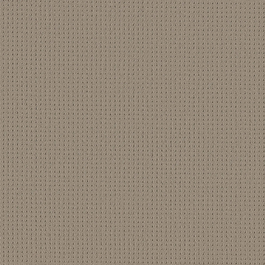 Close-up of San Lucas Family Friendly Carpet in Rockport. This beige carpet features a vertical ribbed texture with alternating raised and recessed lines, creating a cozy, soft look—ideal for high-traffic, family-friendly spaces.