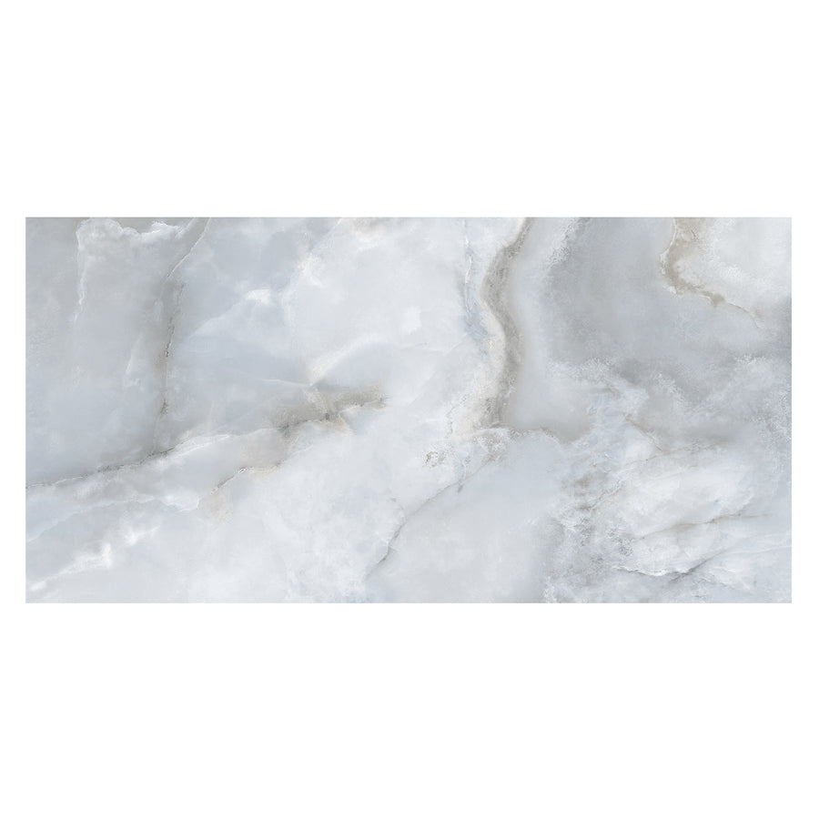 Aura 24" x 48" Porcelain Tile in Pearl Sky features light gray and white marble tones with subtle veining and soft gradients, ideal for a neutral palette and natural texture variations.